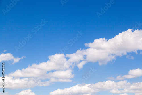 The blue sky with clouds in sunny day