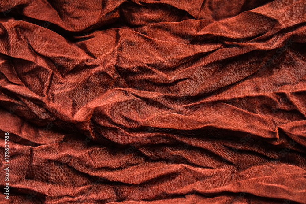 The texture of the copper pleated fabric. Brown georgette fabrics. The texture of the copper pleated fabric. Brown georgette fabrics.