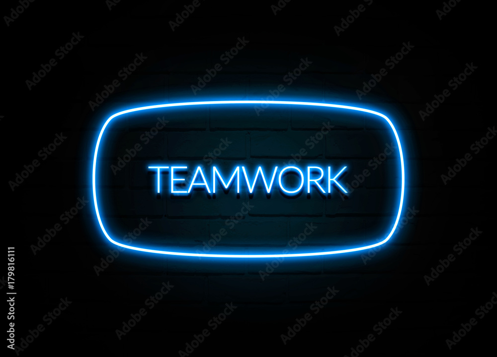 Teamwork  - colorful Neon Sign on brickwall