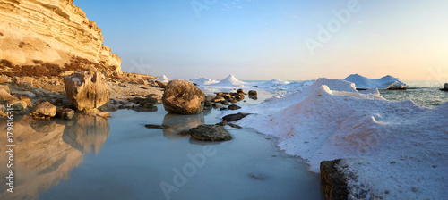 On the shore of the Caspian Sea. The Caspian Sea is the largest enclosed inland water body on Earth by area.