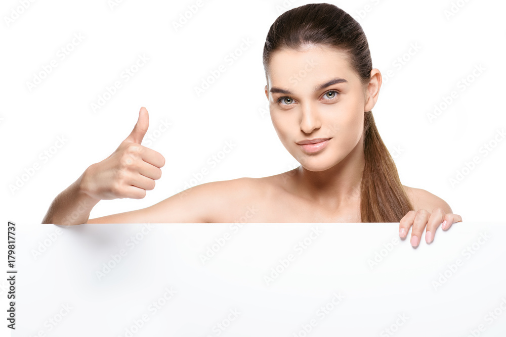 Beautiful woman holding a blank billboard Beautiful woman holding a blank billboard