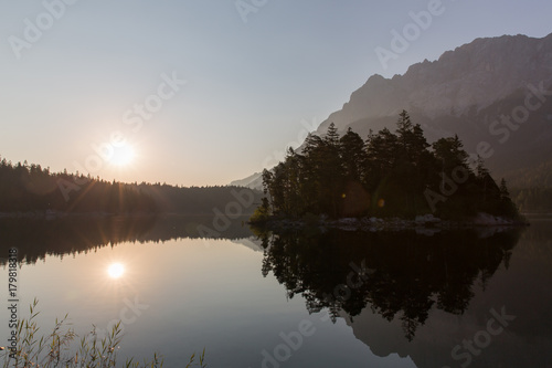 wooden island in a scenic mountainlake