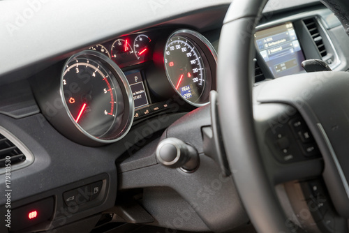 Interior of the car, steering wheel © Filip Olejowski