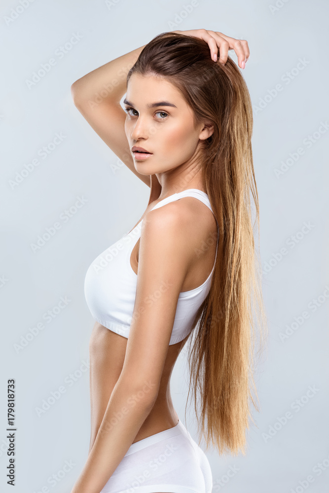 Fototapeta premium Attractive young slim woman