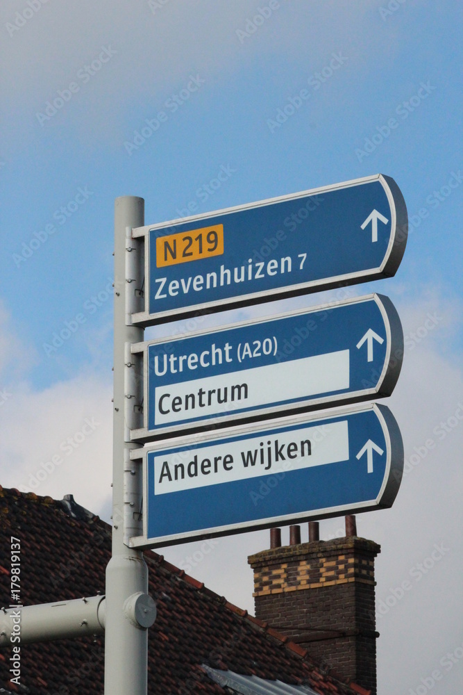 Direction sign on street in Nieuwerkerk aan den IJssel Direction sign on street in Nieuwerkerk aan den IJssel