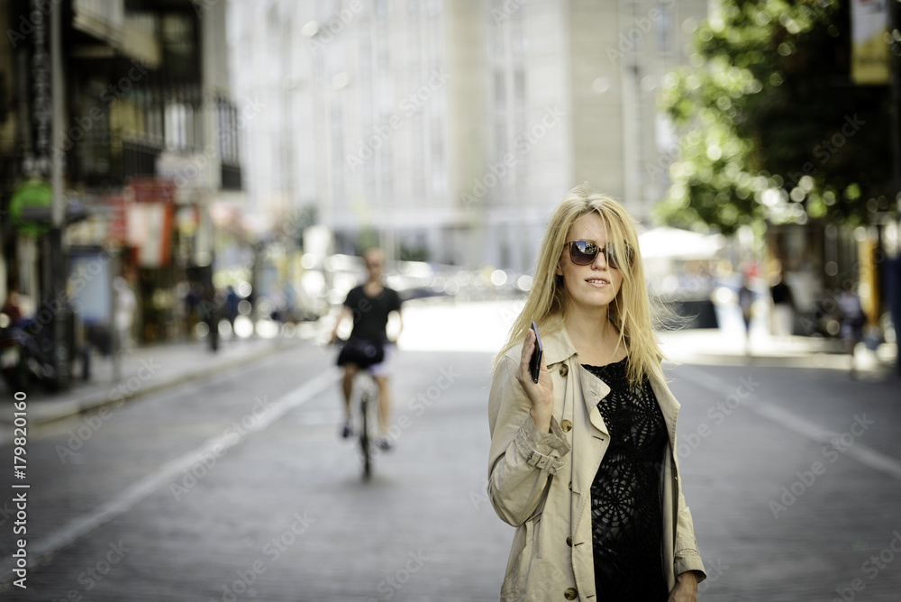 cute woman waiting in the center of Madrid