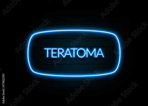 Teratoma  - colorful Neon Sign on brickwall photo