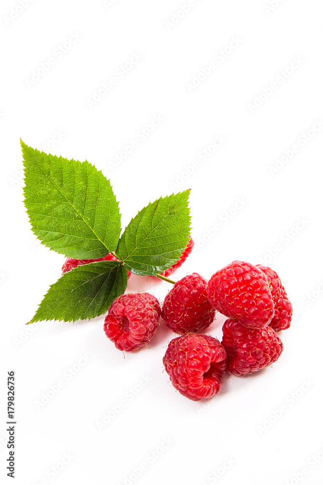 Ripe raspberries with leaf isolated on white background.