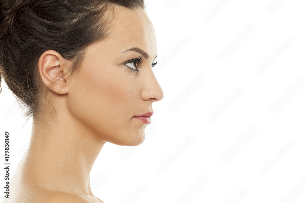 Profile of beautiful young woman on white background Profile of beautiful young woman on white background