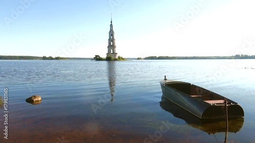 July morning on the Uglich reservoir. View of the flooded belfry of St. Nicholas Cathedral. Kalyazin, Russia