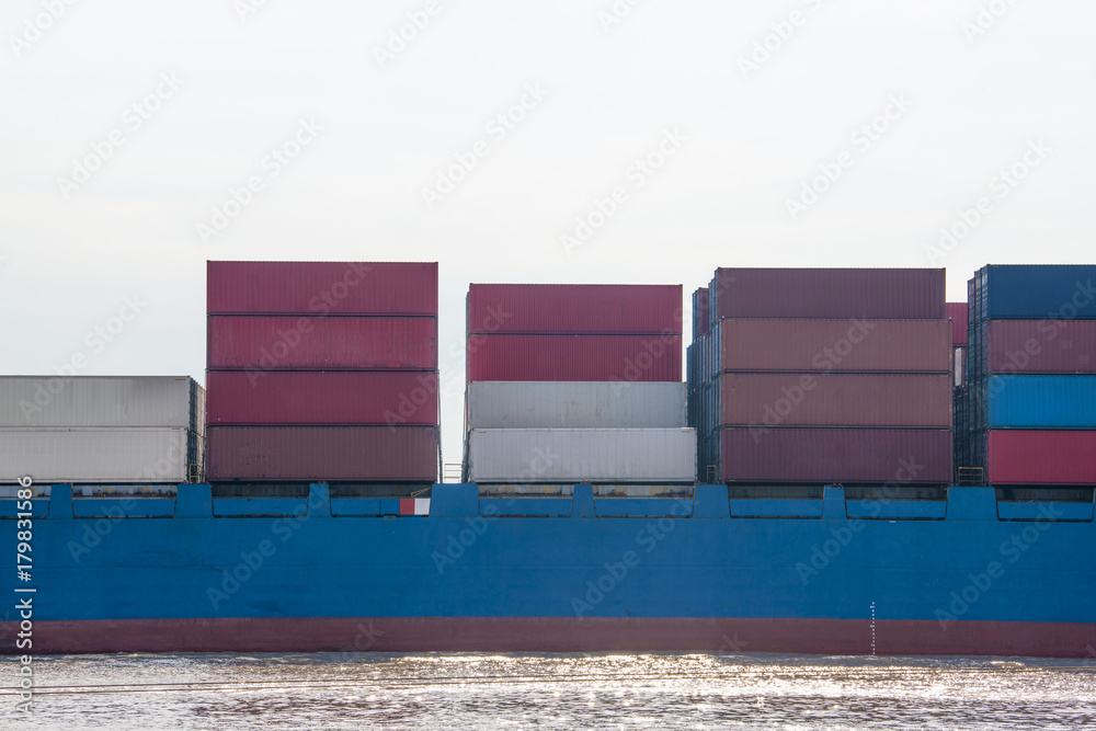 The bow of a huge container ship Hamber Bridge at anchored in the roads ...