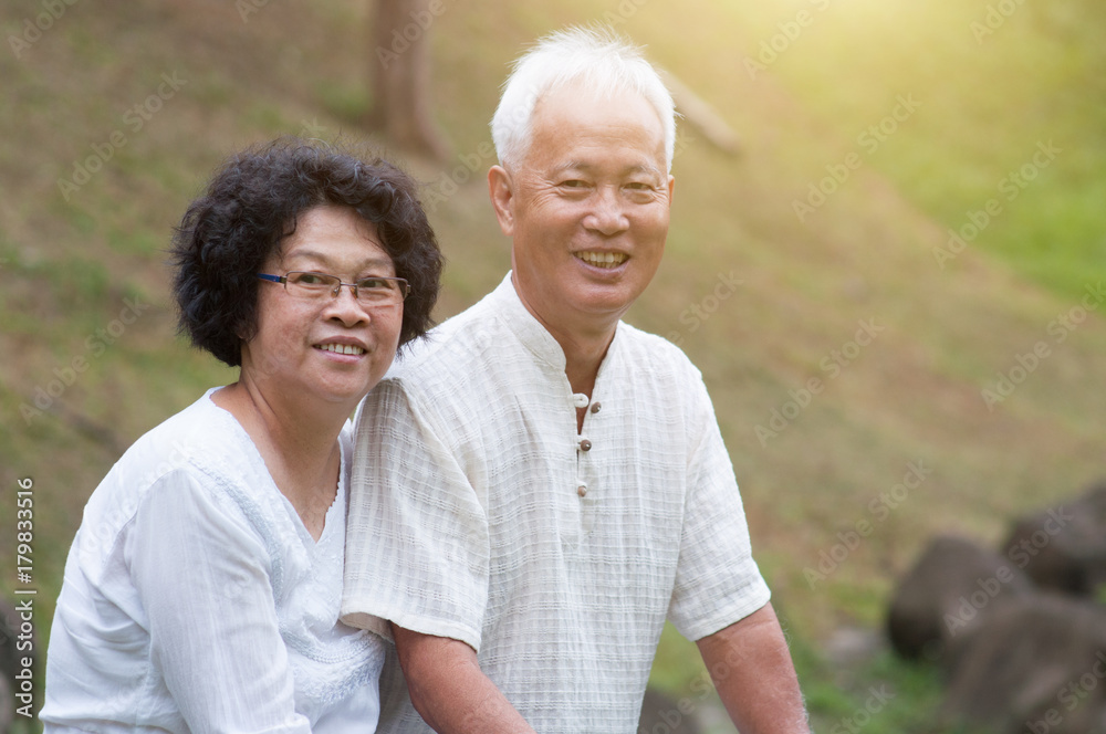 Old Asian couple outdoor portrait. Old Asian couple outdoor portrait.