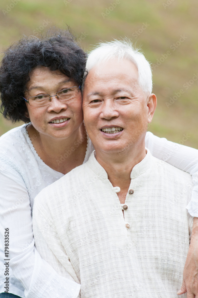 Old Asian couple relaxing outdoor. Old Asian couple relaxing outdoor.