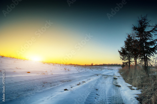 Winter landscape. Wheel tracks in mire at winter