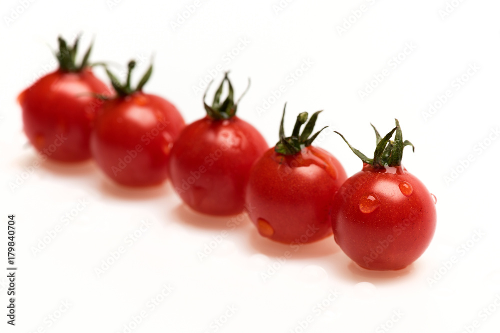 Bunch of cherry tomatoes, close up. Agriculture and fresh food Bunch of cherry tomatoes, close up. Agriculture and fresh food