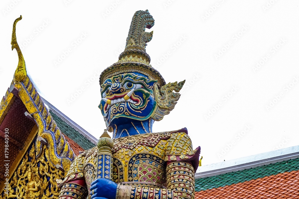 Fototapeta premium Wat Phra Kaew, or the Temple of the Emerald Buddha and Officially as Wat Phra Si Rattana Satsadaram, is regarded as the most sacred Buddhist temple in Bangkok Thailand,symbol Giant statue.