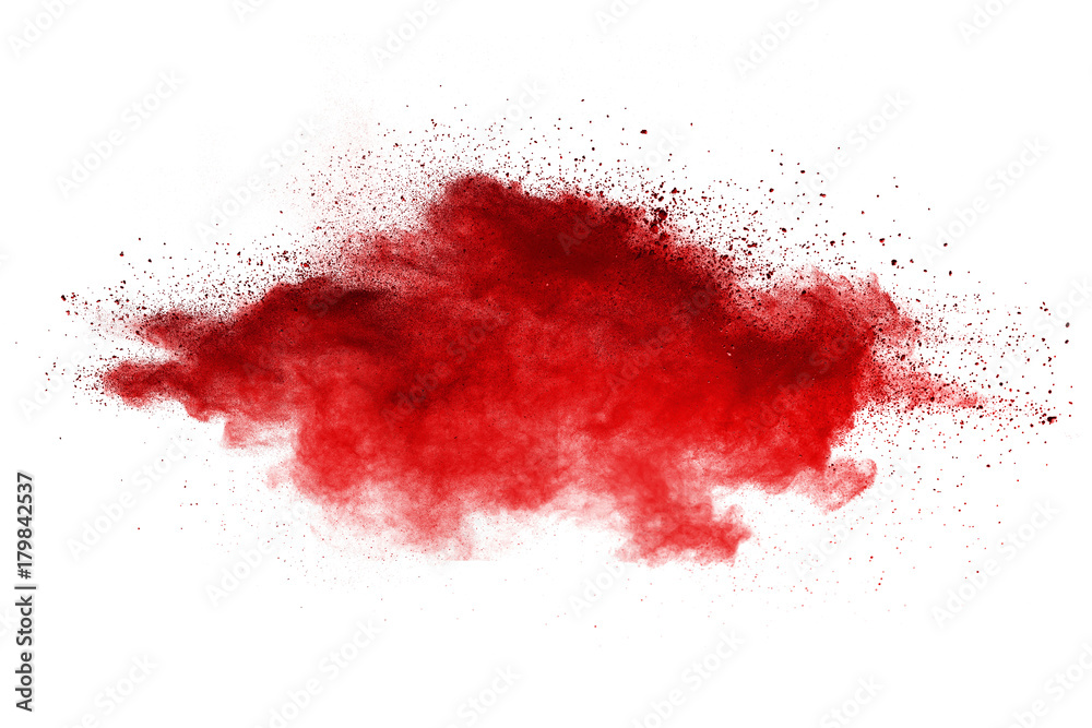 Splash of red powder over white background.