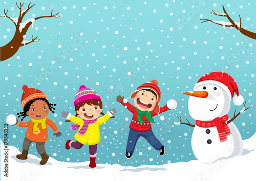 Winter fun. Happy children playing in the snow