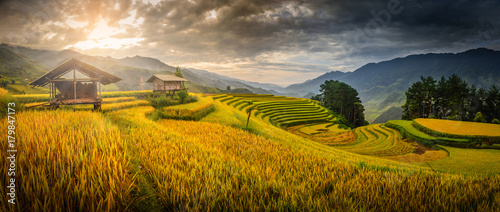 Rice fields on terraced with wooden pavilion at the morning in Mu Cang Chai, YenBai, Vietnam. photo