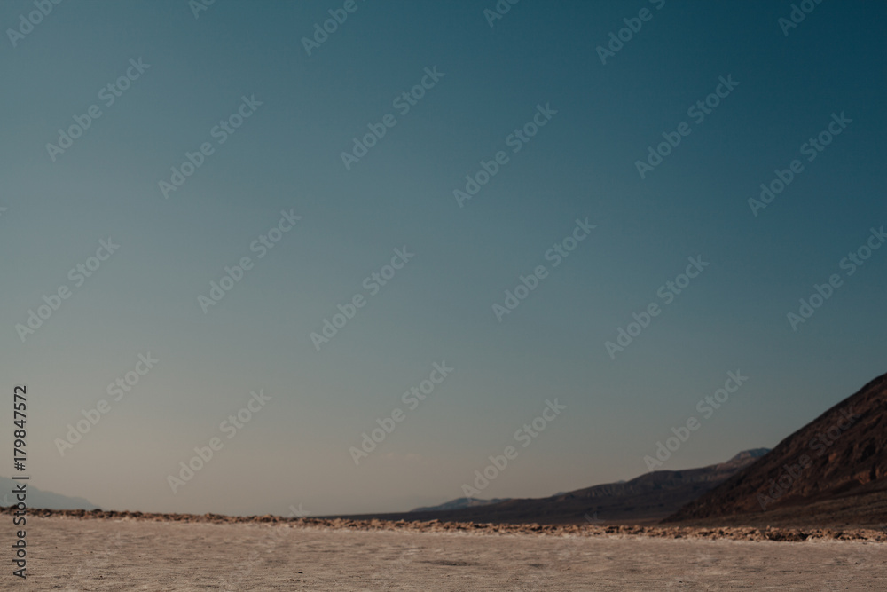 Fototapeta premium Sunset over mountains in Death Valley National Park