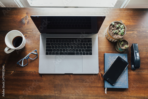 Working at a desk with laptop