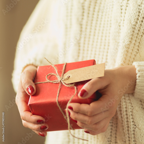 Lady holding new year gift