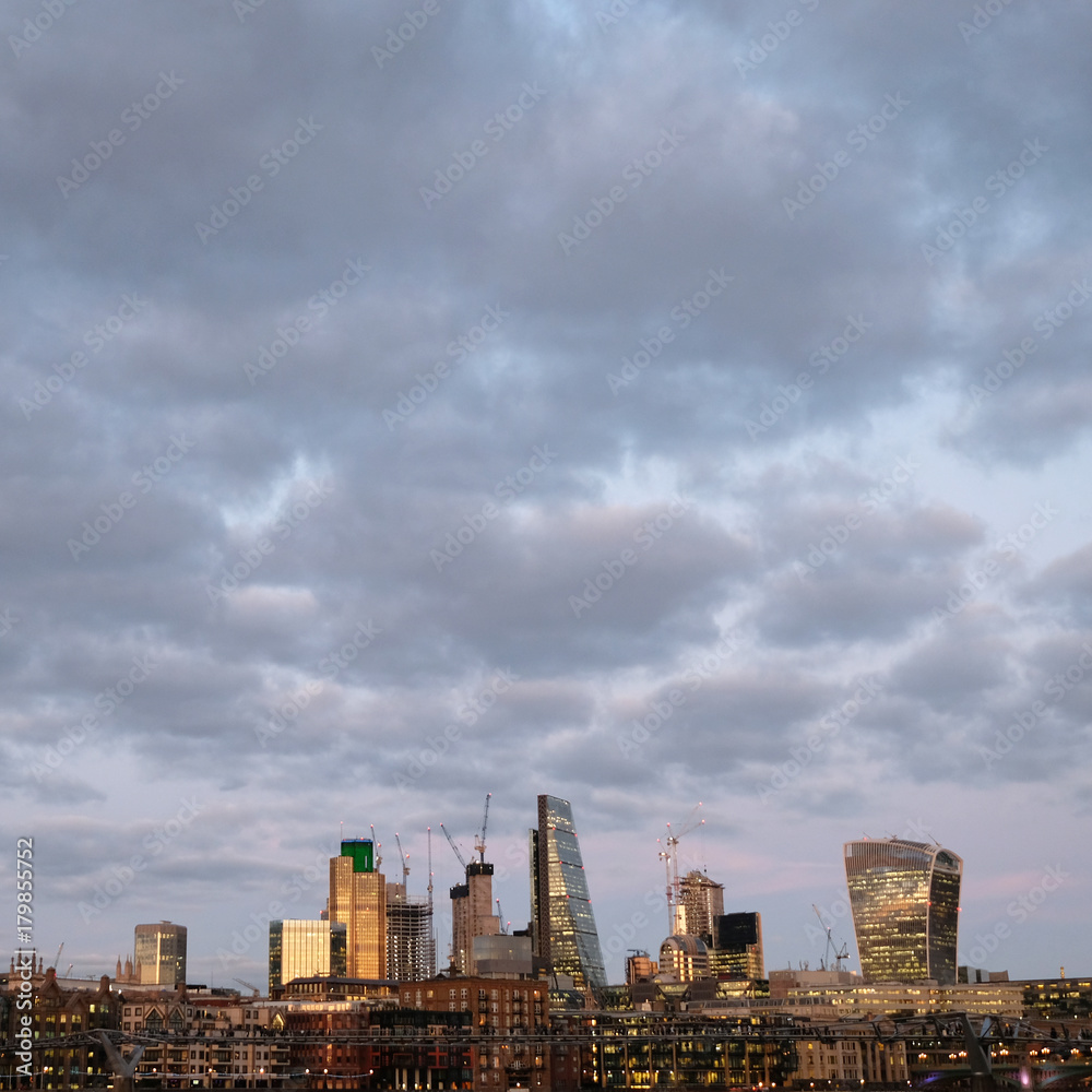 Photo of London City skyline at sunset, taken from The South Bank of the Thames Photo of London City skyline at sunset, taken from The South Bank of the Thames