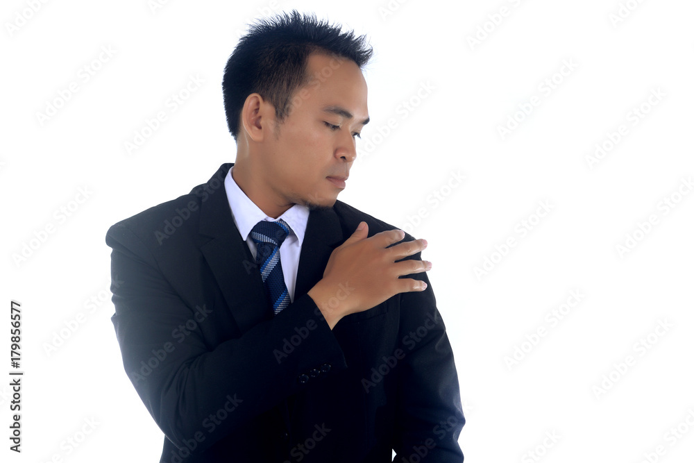 Portrait of a asian businessman cleaning jacket with hand isolated on a white background Portrait of a asian businessman cleaning jacket with hand isolated on a white background