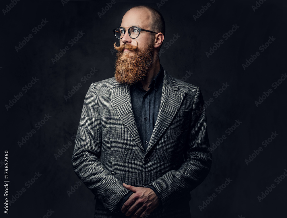 A man dressed in a suit. A man dressed in a suit.