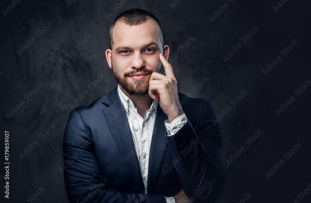 A man dressed in an elegant blue evening suit. A man dressed in an elegant blue evening suit.