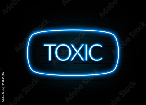 Toxic - colorful Neon Sign on brickwall