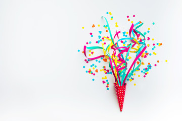Celebration,party backgrounds concepts ideas with colorful confetti,streamers on white.Flat lay