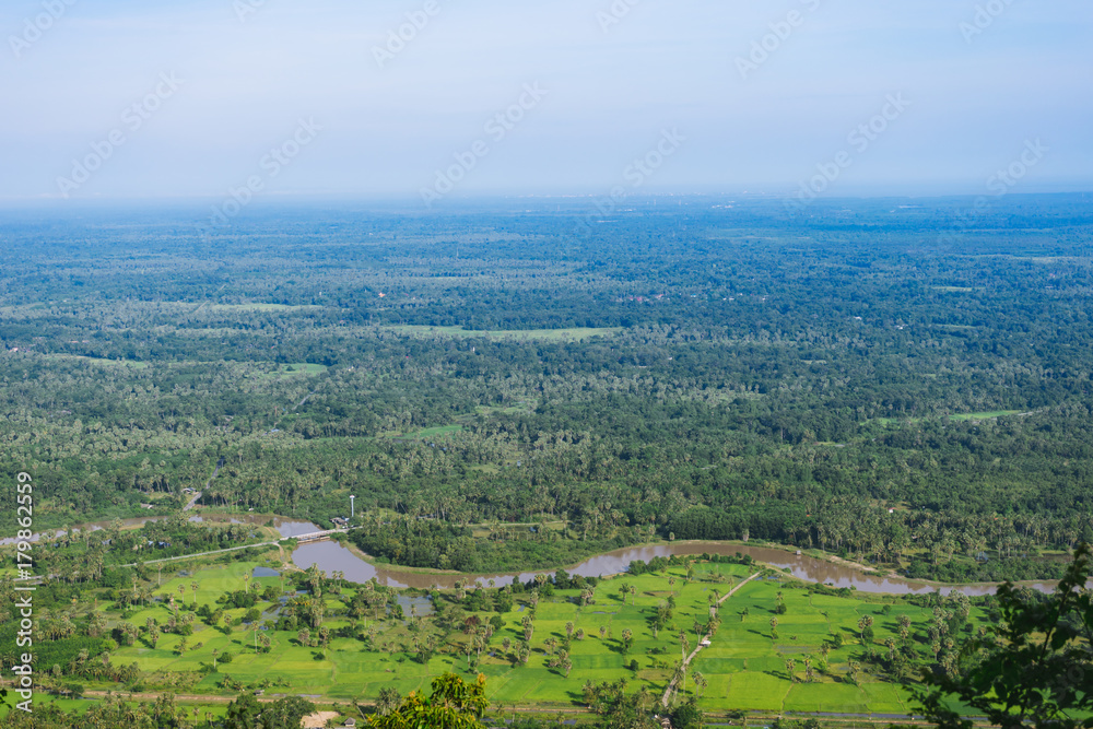 Landscape view of rain forest and river from top of the mountain.