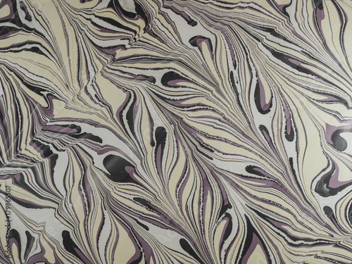 Marbled paper background.