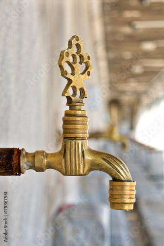 Turkish Ottoman style antique ablution tap with blurred background  Istanbul  Turkey