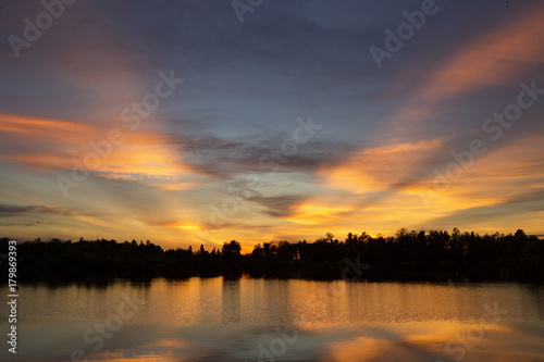 Natural sunset or sunrise at ocean or the lake