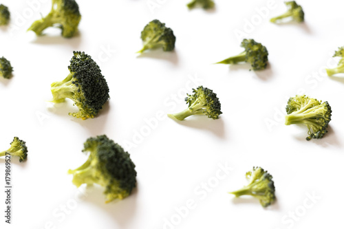 Food pattern made with broccoli on white background. Close up