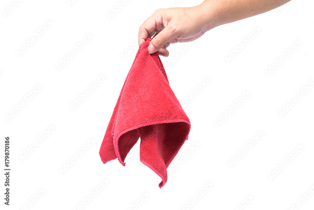 A man's hand is holding a red rag on white background or isolated A man's hand is holding a red rag on white background or isolated