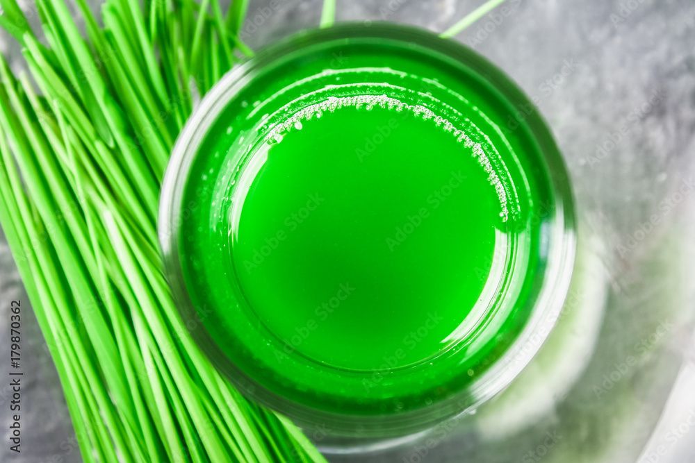 Wheatgrass shot. Juice from wheat grass. Trend of health. Wheatgrass shot. Juice from wheat grass. Trend of health.