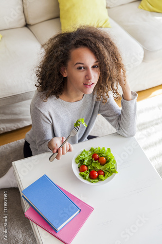 Top view at curly hair teen...
