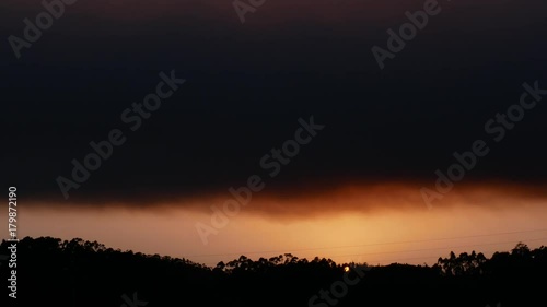 Impressive sunset after a wildfire