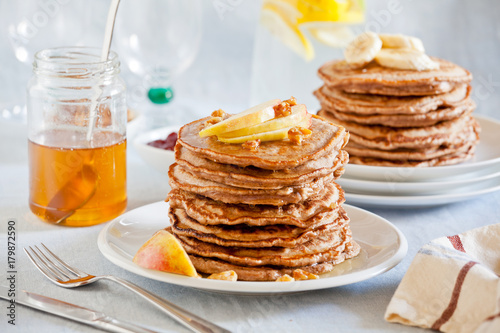 Stacks Of Homemade Whole Wheat Pancakes With Apple Slices