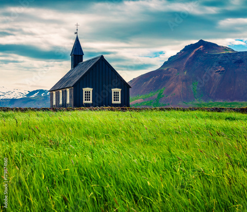 Black wooden Budakirkja church at Saefellsnes photo