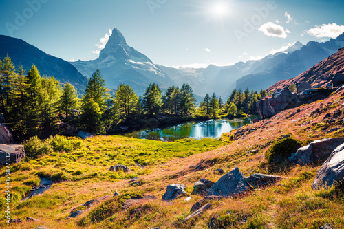 Colorful summer sunrise on the Grindjisee lake