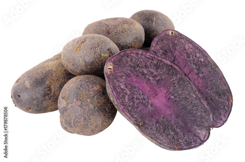 Group of raw purple majesty potatoes isolated on a white background