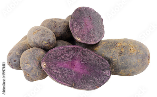 Group of raw purple majesty potatoes isolated on a white background photo