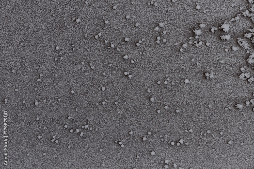 texture of hoarfrost on a dark surface texture of hoarfrost on a dark surface
