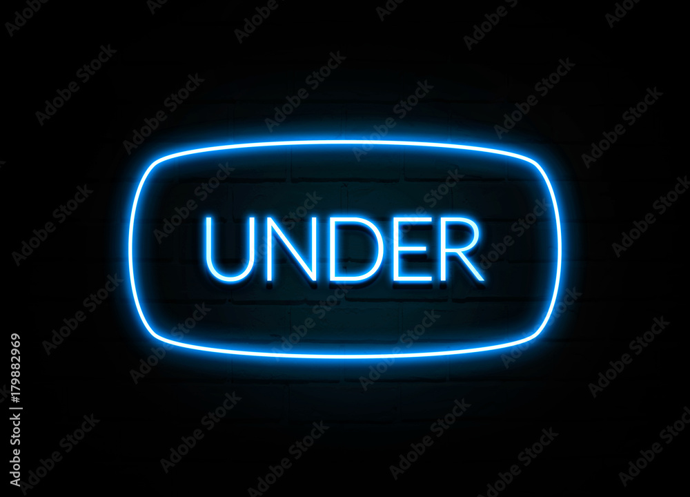 Under - colorful Neon Sign on brickwall Under - colorful Neon Sign on brickwall