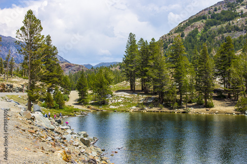 Views of Tenaya Lake, an alpine lake in Yosemite National Park, California, located at an elevation of 2,484 m (8,150 feet)