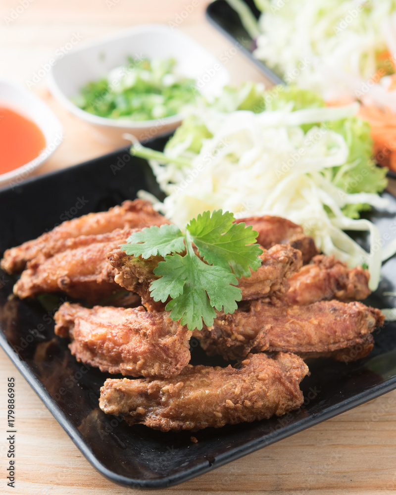 Thailand food,Deep Fried Chicken Wings on wood